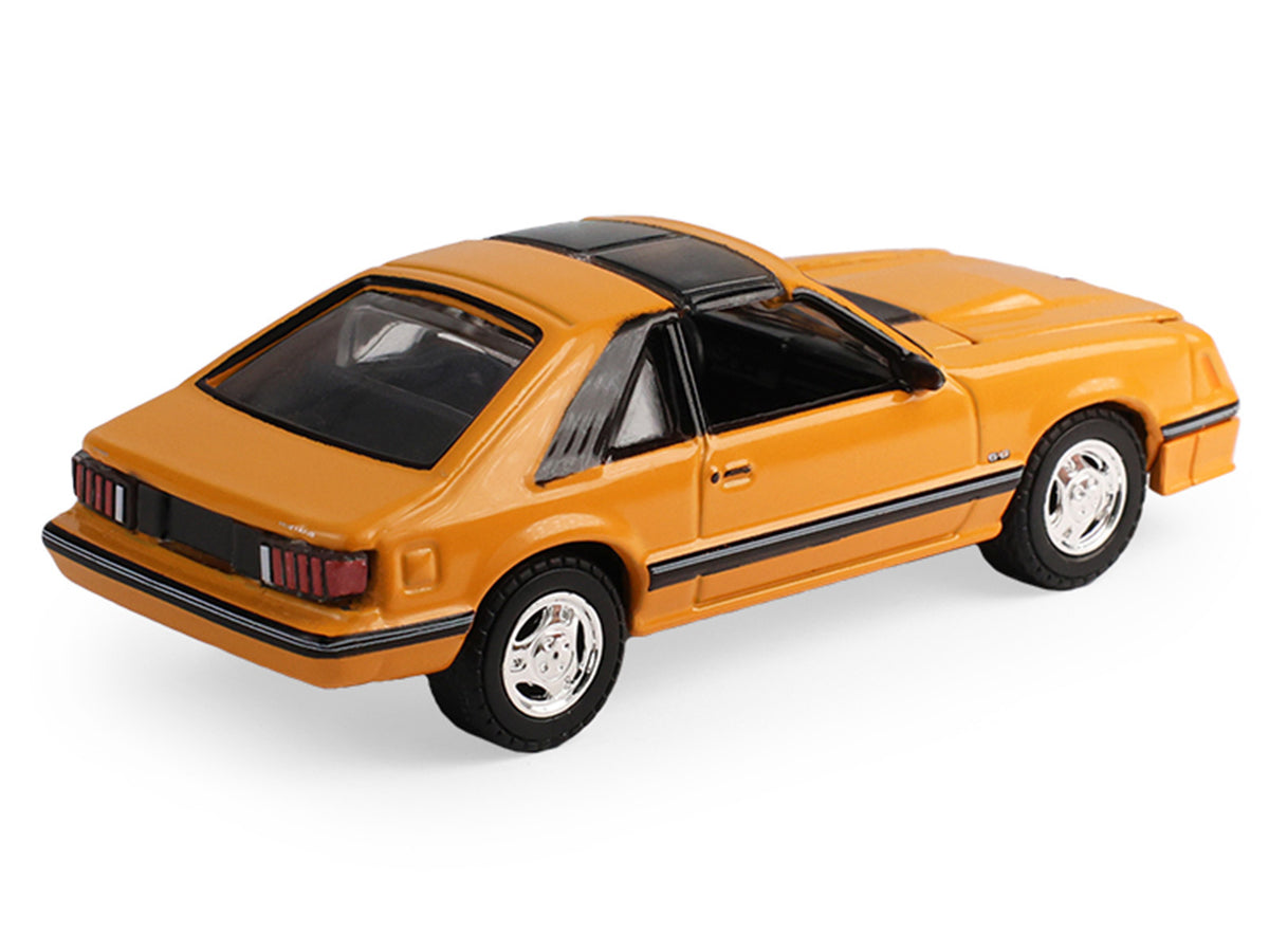 1982 Ford Foxbody Mustang Medium Vanilla Yellow with Black Top "The Mustang Stampede" Series 2 1/64 Diecast Model Car by Greenlight - image 4