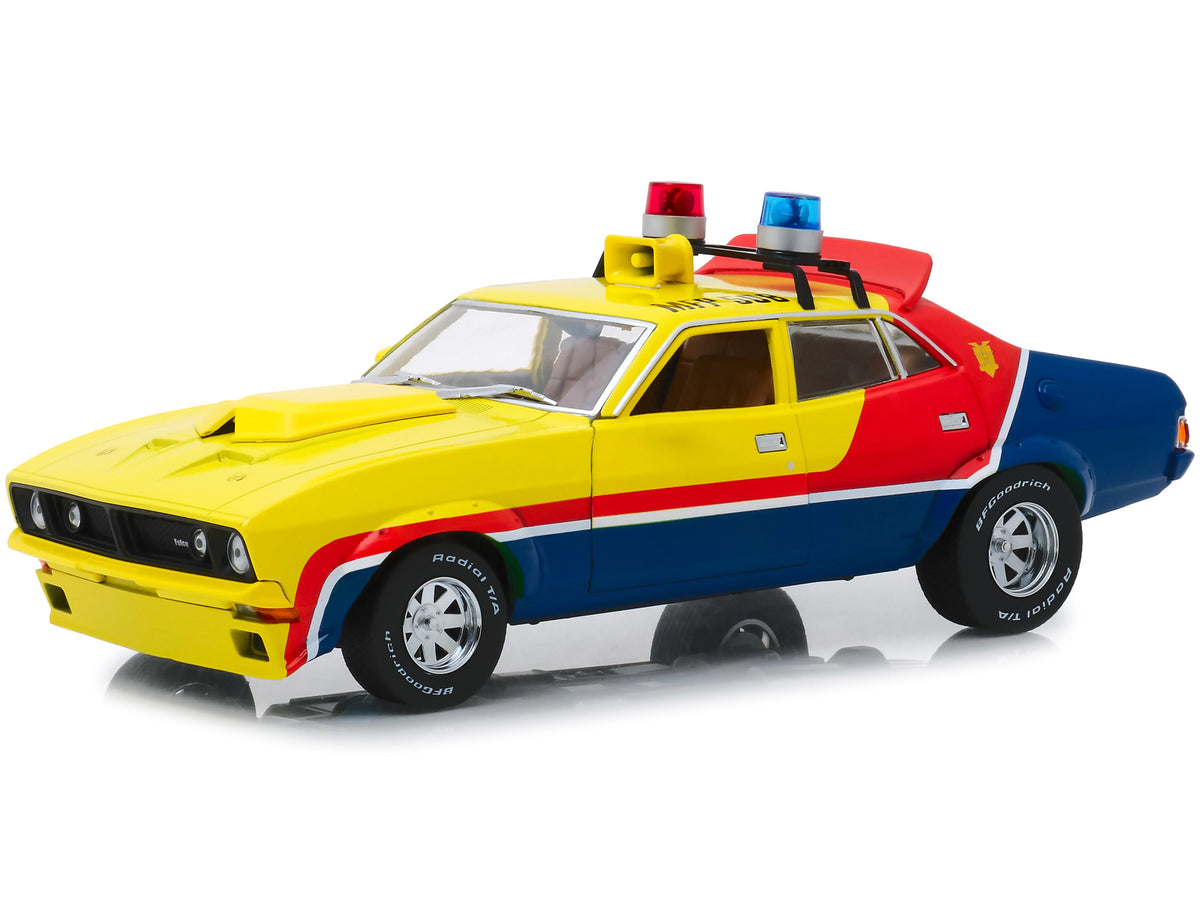 1974 Ford Falcon XB 4-Door Sedan RHD (Right Hand Drive) Yellow and Blue with Red Stripes "MFP 508" "First of the V8 Interceptors" (1979) Movie 1/18 Diecast Model Car by Greenlight - image 3