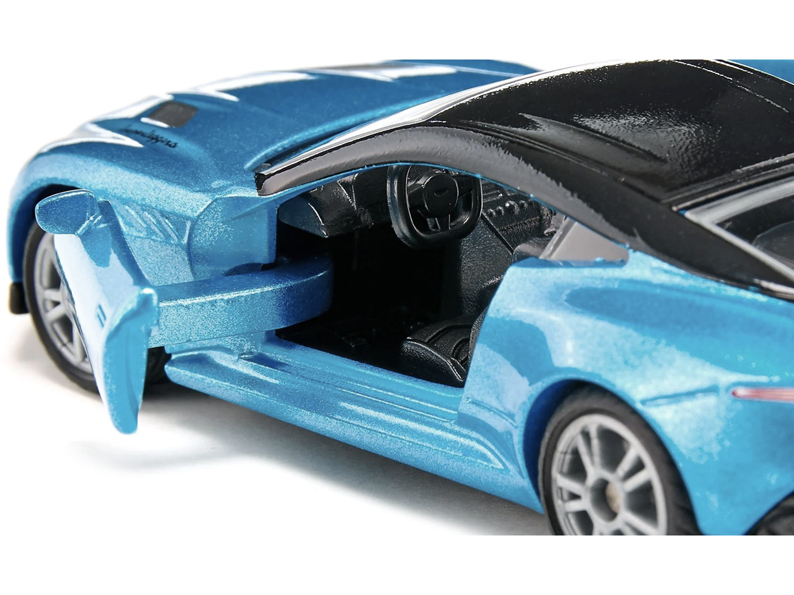 Aston Martin DBS Superleggera Blue Metallic with Black Top Diecast Model Car by Siku - image 3