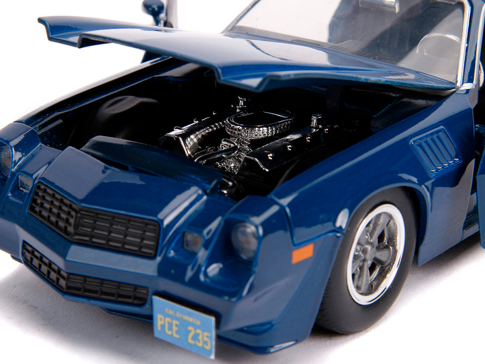 Billy's Chevrolet Camaro Z28 Dark Blue with Collectible Coin "Stranger Things" (2016) TV Series 1/24 Diecast Model Car by Jada - image 4
