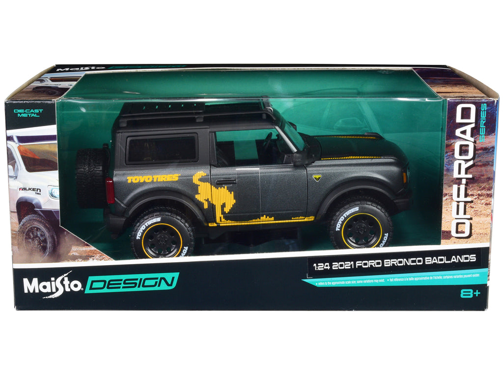2021 Ford Bronco Badlands Dark Gray Metallic with Gold Graphics and Roof Rack "Off-Road" "Maisto Design" Series 1/24 Diecast Model Car by Maisto - image 3
