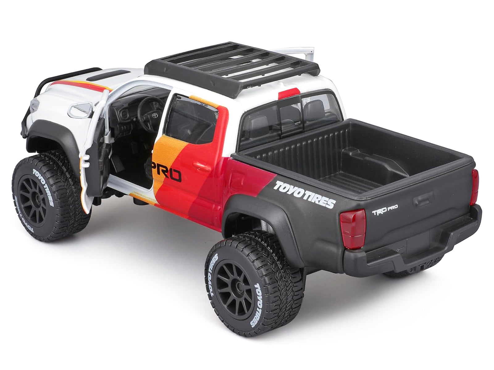 2023 Toyota Tacoma TRD PRO Off Road Pickup Truck White with Graphics and Roof Rack "Maisto Design" Series 1/27 Diecast Model Car Maisto