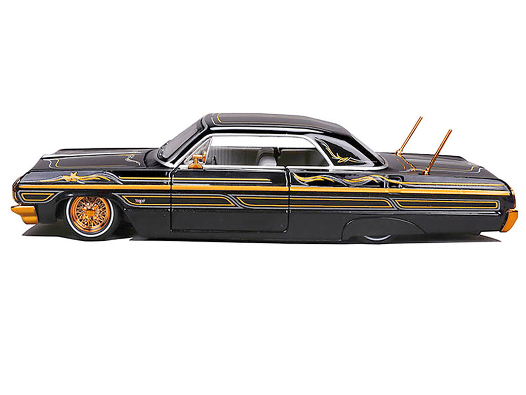 1964 Chevrolet Impala SS Lowrider Black Metallic with Gold Graphics and Gray Interior "Lowriders" "Maisto Design" Series 1/26 Diecast Model Car by Maisto - image 2
