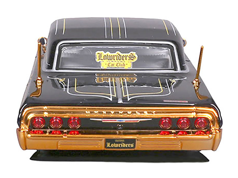 1964 Chevrolet Impala SS Lowrider Black Metallic with Gold Graphics and Gray Interior "Lowriders" "Maisto Design" Series 1/26 Diecast Model Car by Maisto - image 3
