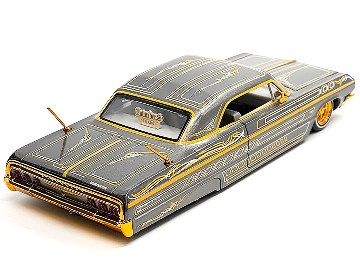 1964 Chevrolet Impala SS Lowrider Gray Metallic with Gold Graphics "Lowriders" "Maisto Design" Series 1/26 Diecast Model Car by Maisto - image 2