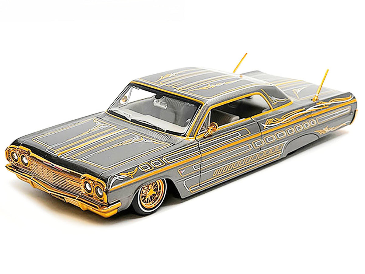 1964 Chevrolet Impala SS Lowrider Gray Metallic with Gold Graphics "Lowriders" "Maisto Design" Series 1/26 Diecast Model Car by Maisto - image 3