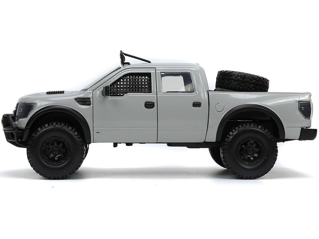 2011 Ford F-150 SVT Raptor Pickup Truck Light Gray with Extra Wheels "Just Trucks" Series 1/24 Diecast Model Car by Jada - image 4