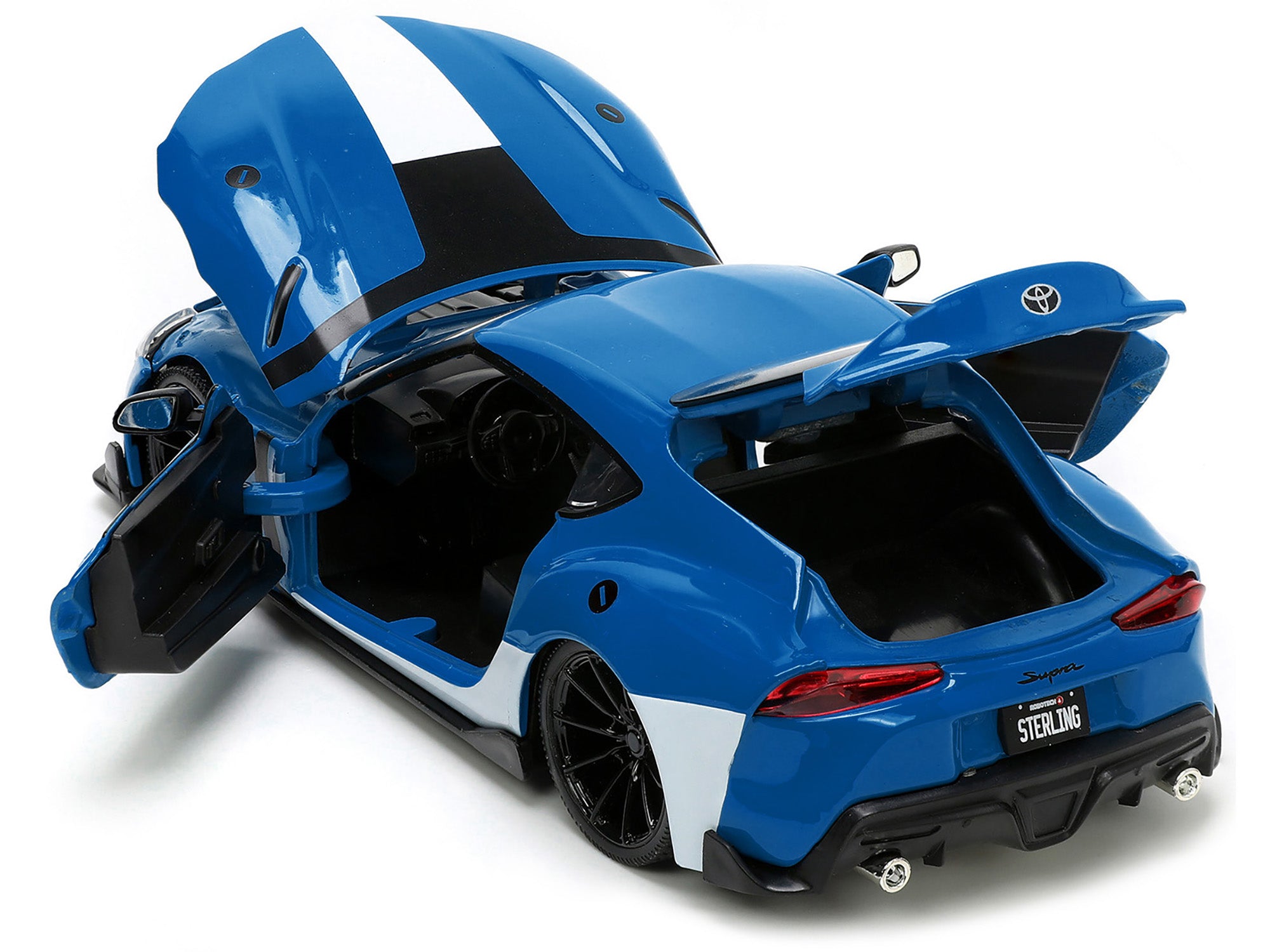 2020 Toyota Supra Blue with Graphics and Max Sterling Diecast Figurine "Robotech" "Hollywood Rides" Series 1/24 Diecast Model Car by Jada - image 4