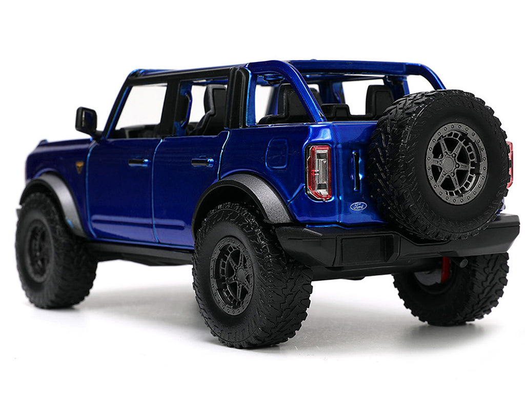 2021 Ford Bronco Open-Top Candy Blue Metallic with Extra Wheels "Just Trucks" Series 1/24 Diecast Model Car by Jada - image 5