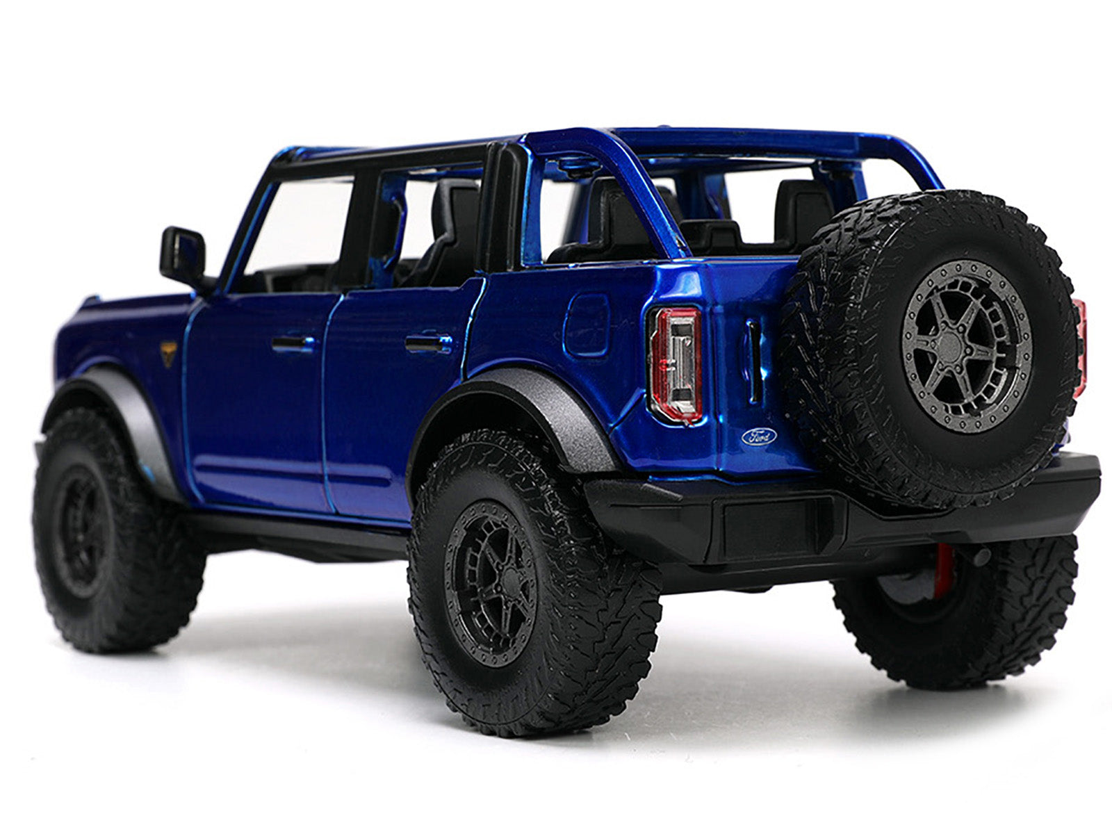2021 Ford Bronco Open-Top Candy Blue Metallic with Extra Wheels "Just Trucks" Series 1/24 Diecast Model Car by Jada - image 5