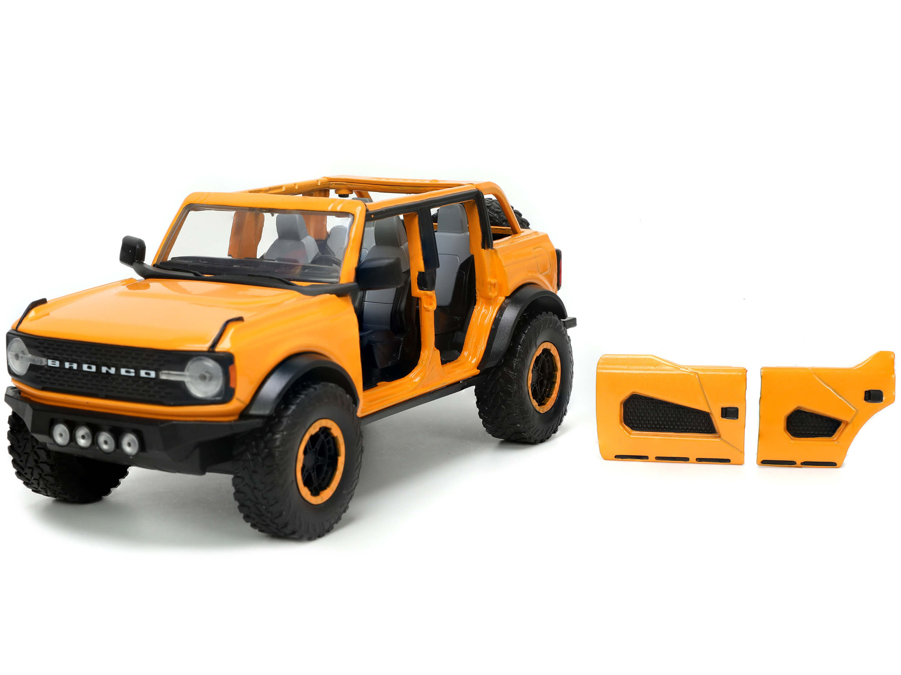 2021 Ford Bronco Orange Metallic with Extra Wheels "Just Trucks" Series 1/24 Diecast Model Car by Jada - image 2
