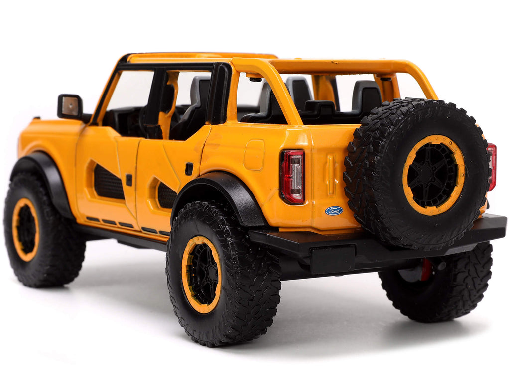 2021 Ford Bronco Orange Metallic with Extra Wheels "Just Trucks" Series 1/24 Diecast Model Car by Jada - image 4