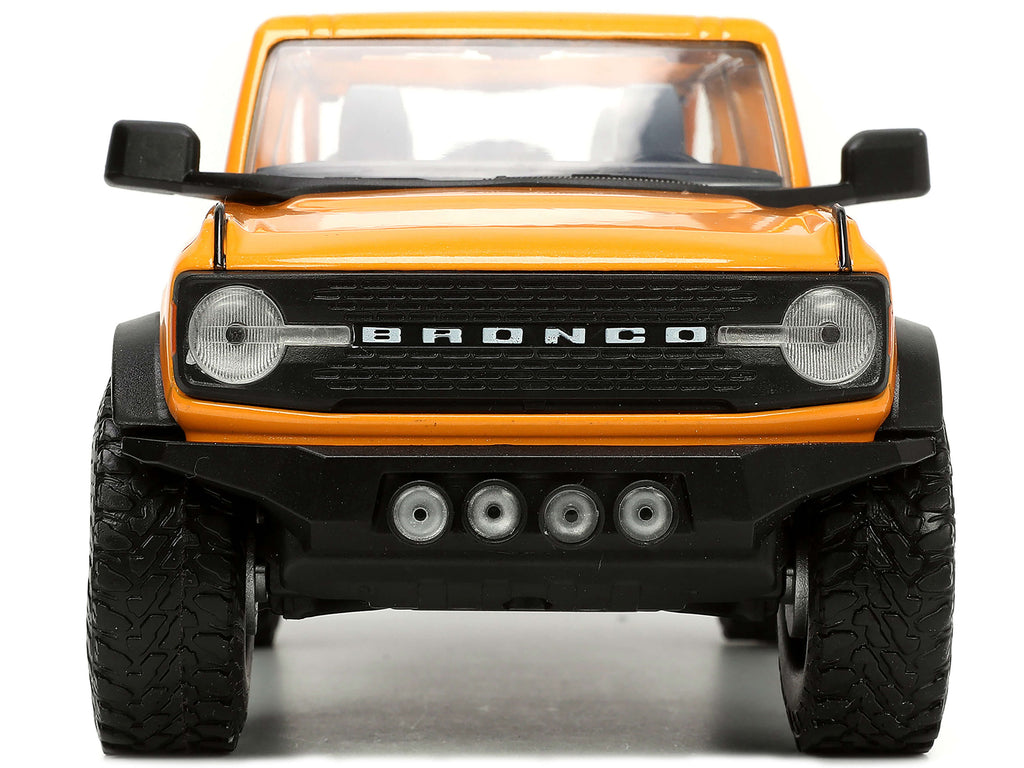 2021 Ford Bronco Orange Metallic with Extra Wheels "Just Trucks" Series 1/24 Diecast Model Car by Jada - image 5