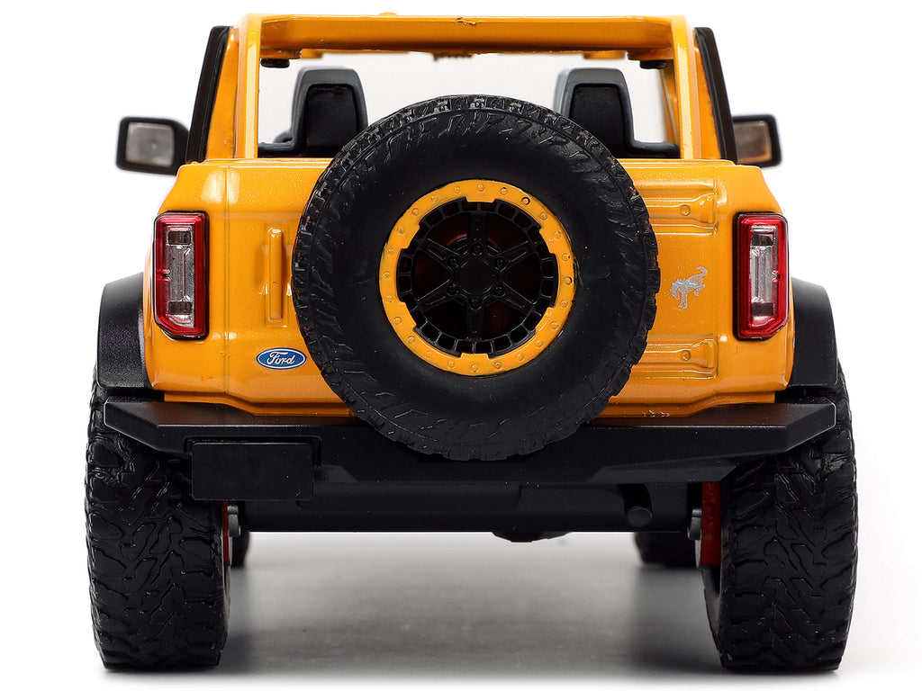 2021 Ford Bronco Orange Metallic with Extra Wheels "Just Trucks" Series 1/24 Diecast Model Car by Jada - image 6