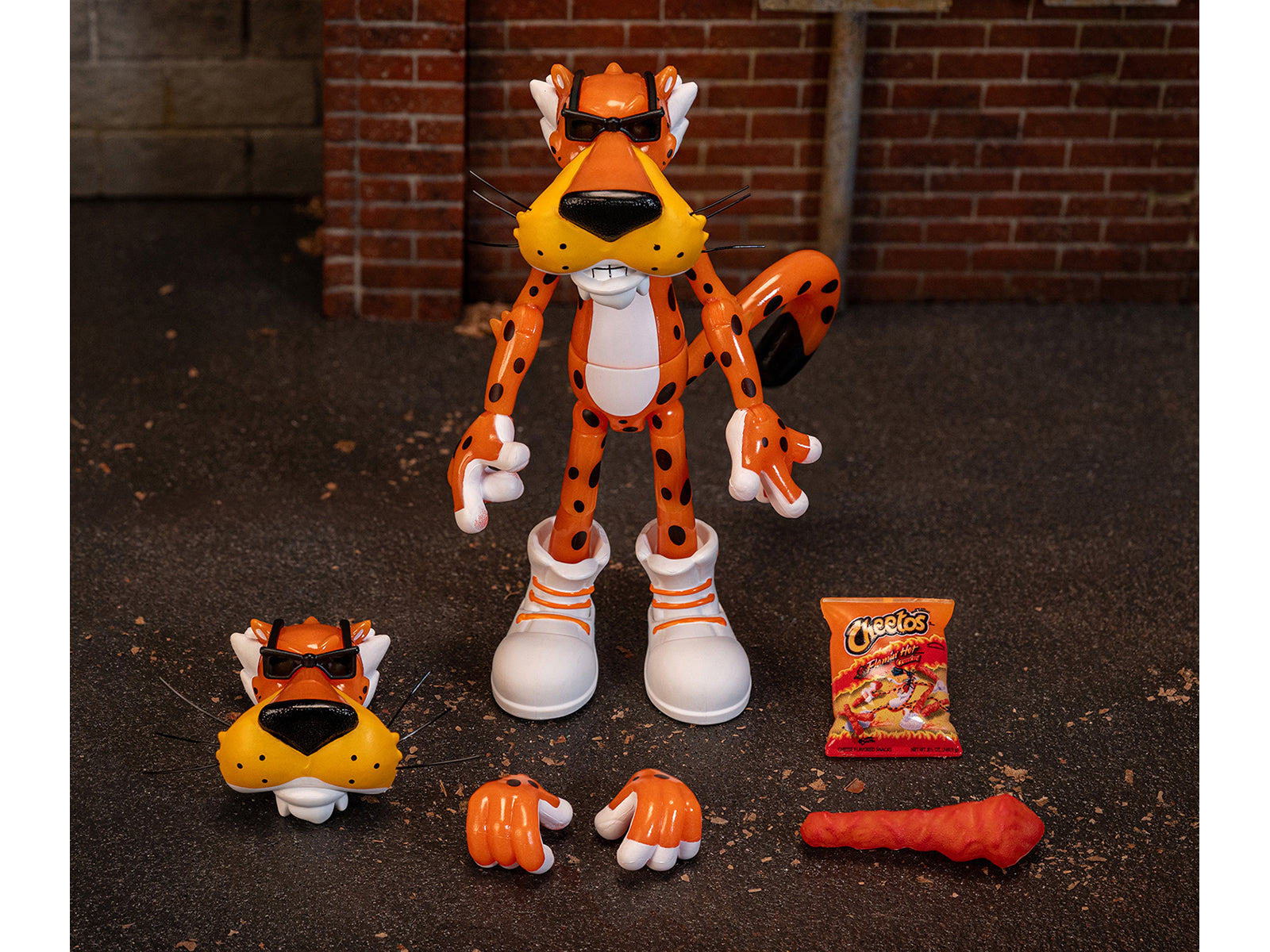 Chester Cheetah 5.5" Glow-in-the-Dark Figure with Accessories and Alternate Head and Hands "Flamin' Hot Cheetos Crunchy" Model by Jada - image 3