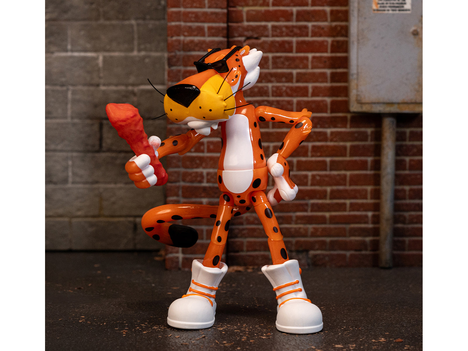 Chester Cheetah 5.5" Glow-in-the-Dark Figure with Accessories and Alternate Head and Hands "Flamin' Hot Cheetos Crunchy" Model by Jada - image 4