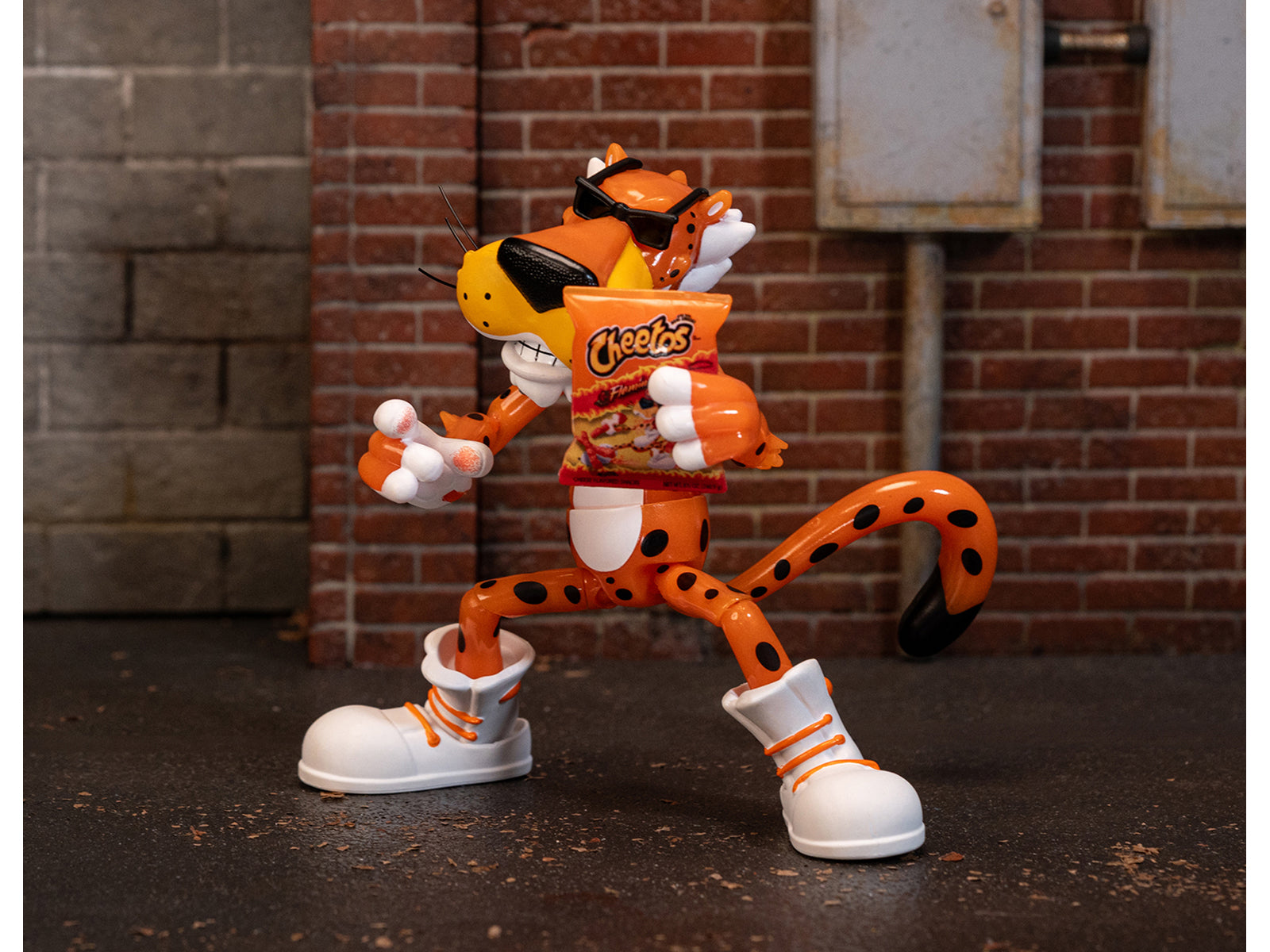 Chester Cheetah 5.5" Glow-in-the-Dark Figure with Accessories and Alternate Head and Hands "Flamin' Hot Cheetos Crunchy" Model by Jada - image 5