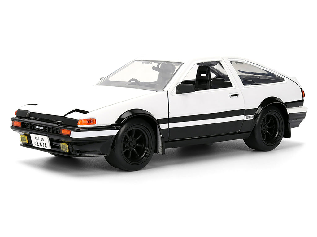 Toyota Trueno (AE86) RHD (Right Hand Drive) White and Black with Graphics and Takumi Diecast Figure "Initial D" (1998-2021) TV Series "Anime Hollywood Rides" Series 1/24 Diecast Model by Jada - image 2