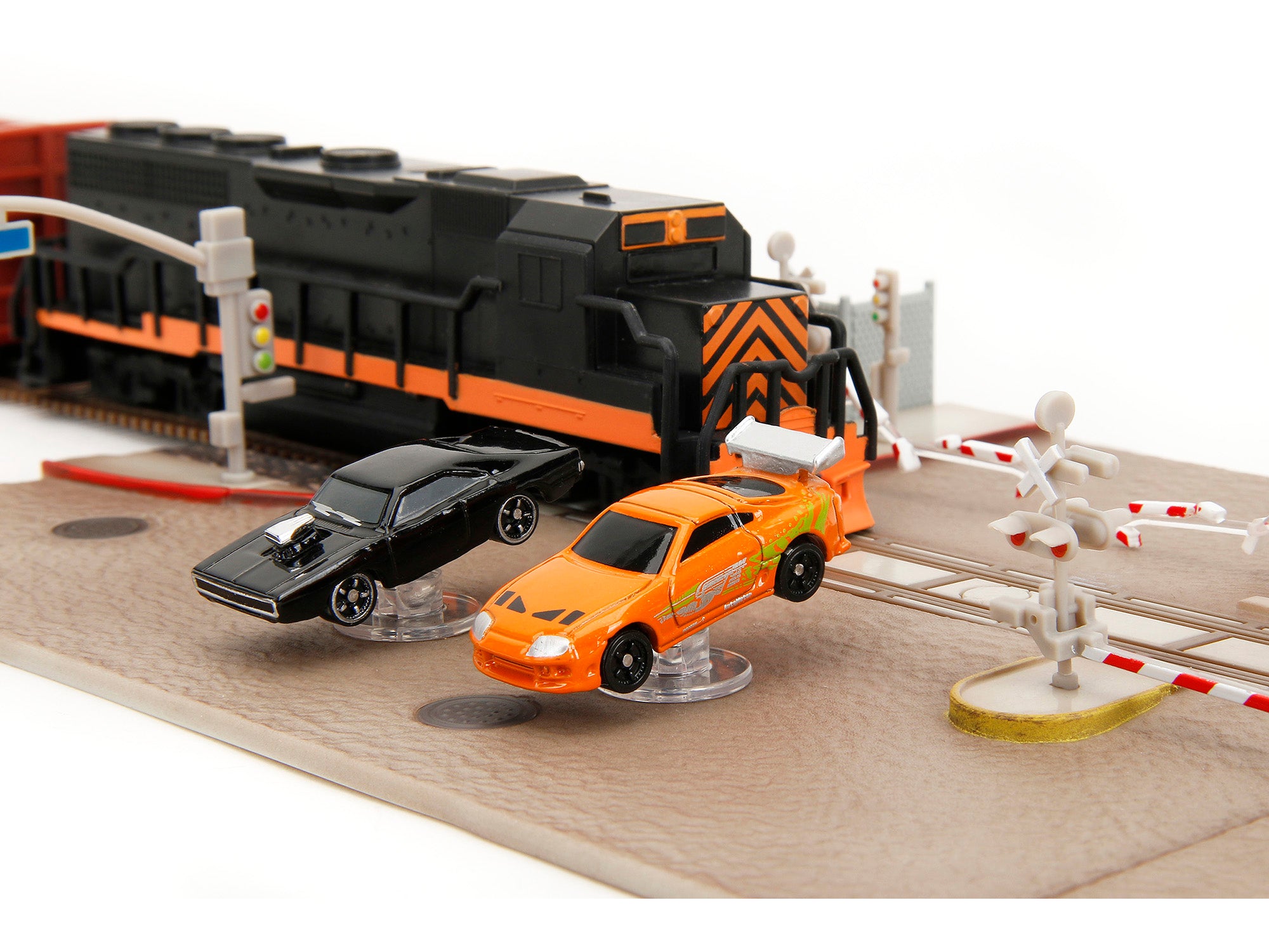 "Fast & Furious" Final Race Diorama with Toyota Supra Orange and Dodge Charger Black "Nano Scene" Series model by Jada - image 5