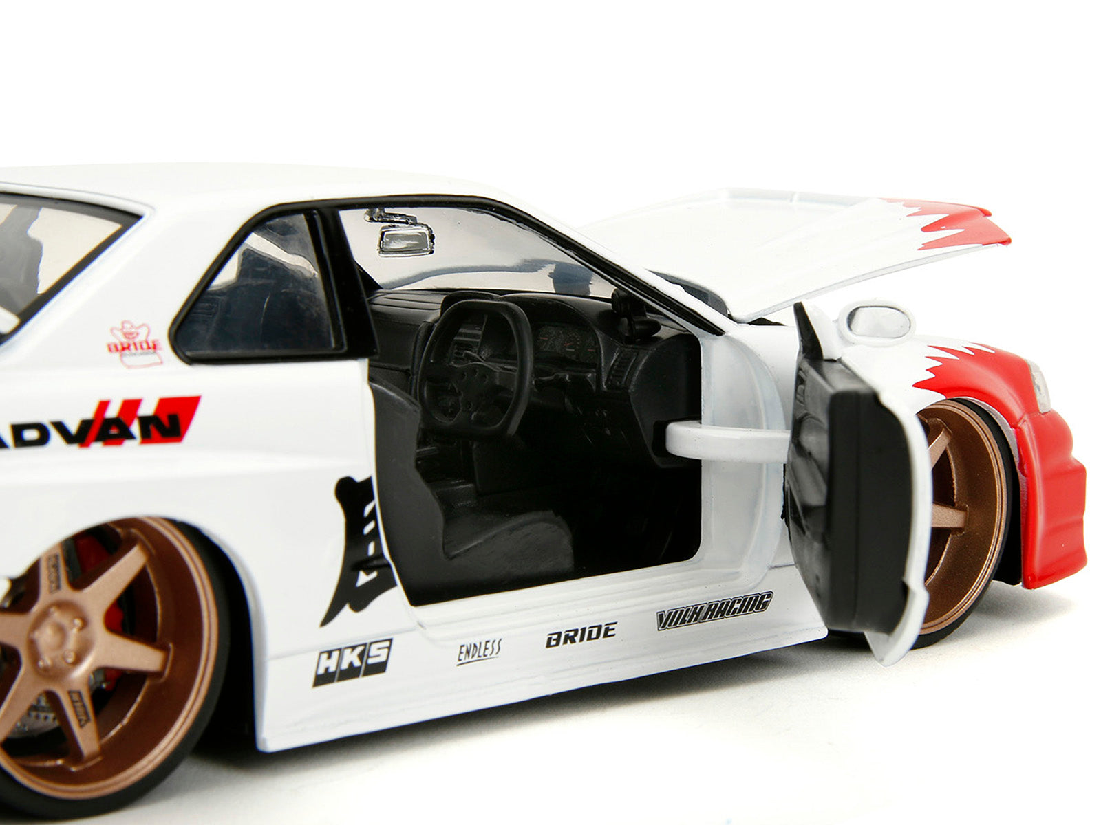 2002 Nissan Skyline GT-R (R34) RHD (Right Hand Drive) White with Red Graphics and Ryu Diecast Figure "Street Fighter" Video Game "Anime Hollywood Rides" Series 1/24 Diecast Model Car by Jada - image 3