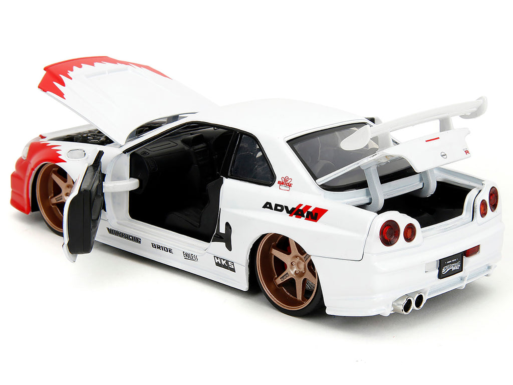 2002 Nissan Skyline GT-R (R34) RHD (Right Hand Drive) White with Red Graphics and Ryu Diecast Figure "Street Fighter" Video Game "Anime Hollywood Rides" Series 1/24 Diecast Model Car by Jada - image 4