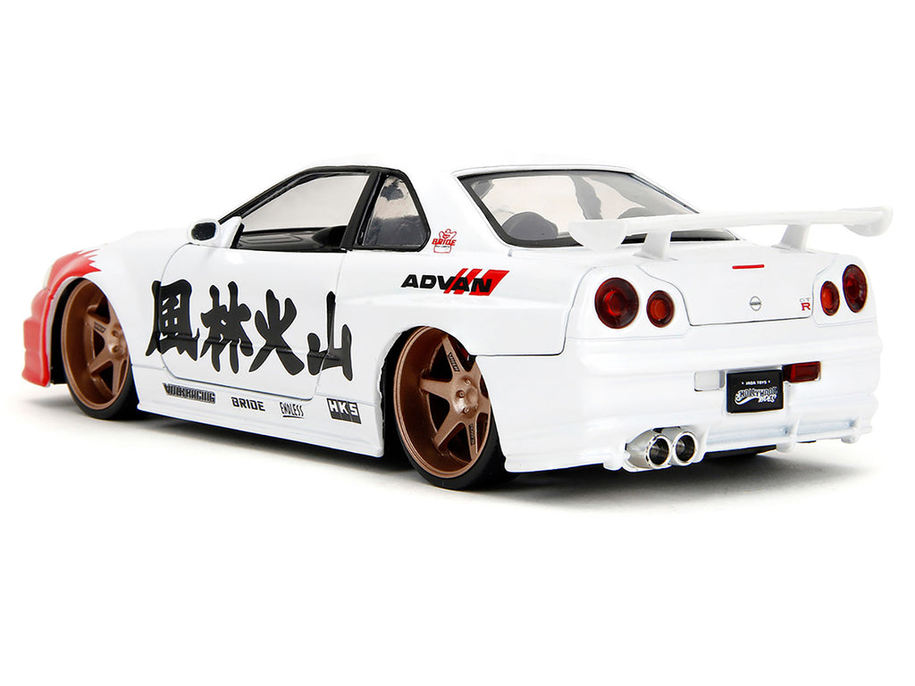 2002 Nissan Skyline GT-R (R34) RHD (Right Hand Drive) White with Red Graphics and Ryu Diecast Figure "Street Fighter" Video Game "Anime Hollywood Rides" Series 1/24 Diecast Model Car by Jada - image 5