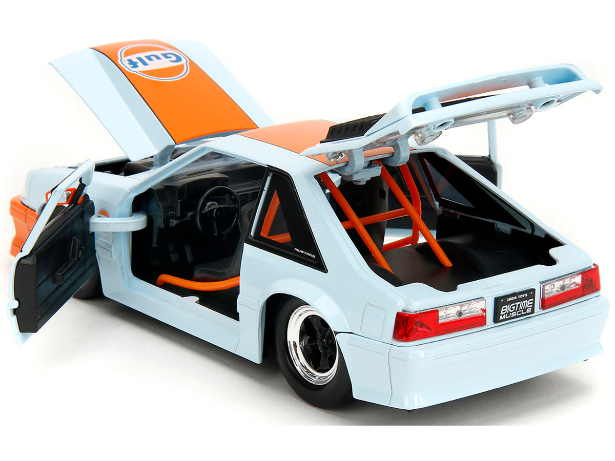 1989 Ford Mustang GT "Gulf Oil" Light Blue with Orange Stripe "Bigtime Muscle" Series 1/24 Diecast Model Car by Jada - image 4