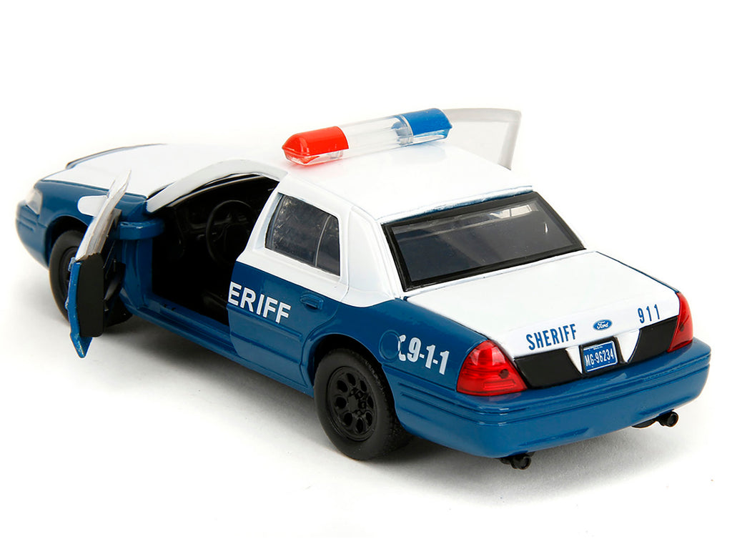 Rick Grimes' Ford Crown Victoria "Sheriff" Blue and White "The Walking Dead" (2010-2022) TV Series "Hollywood Rides" Series 1/32 Diecast Model Car by Jada - image 5