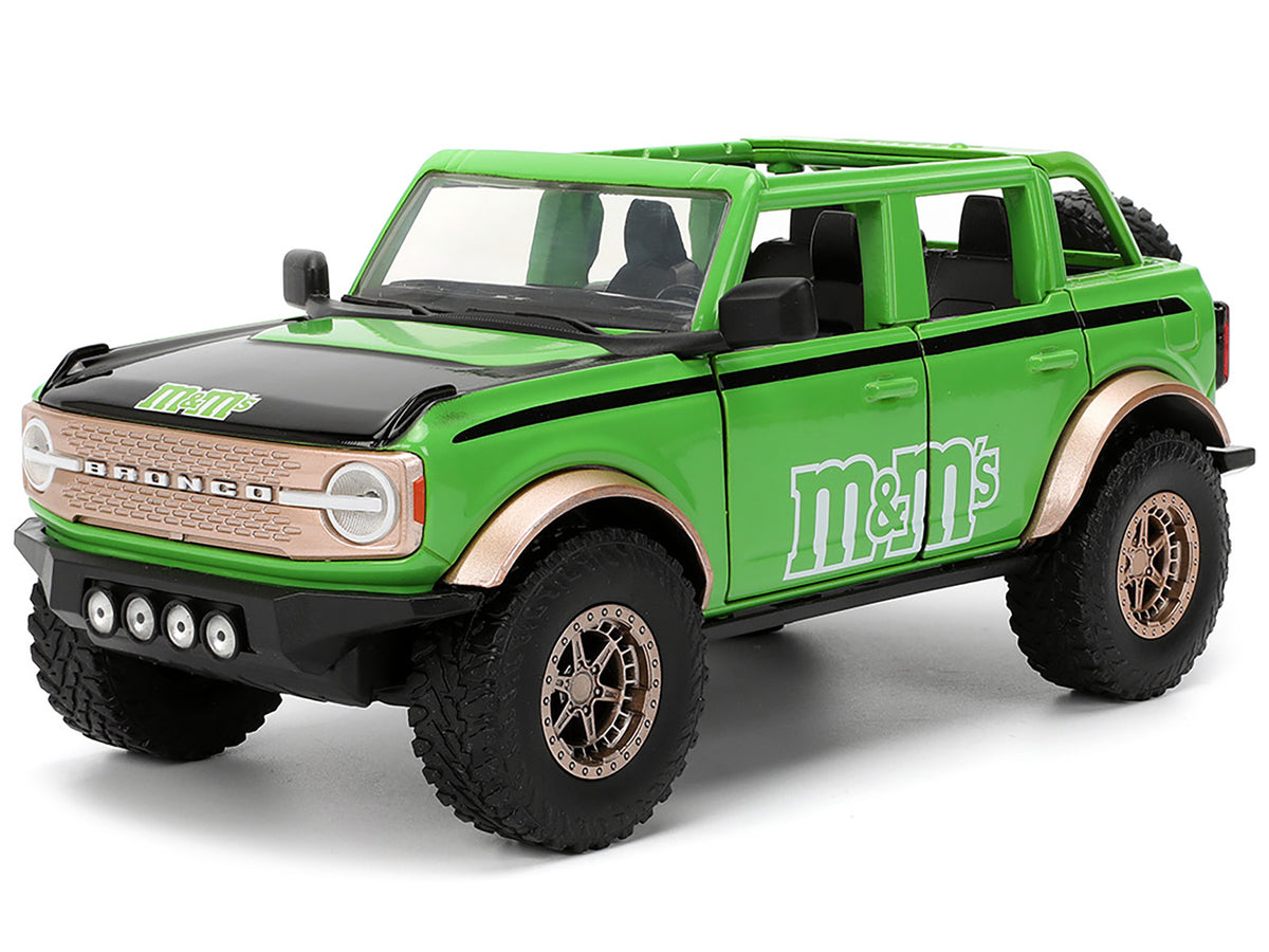 2021 Ford Bronco Green with Black Stripes and Green M&M's Diecast Figure "Hollywood Rides" Series 1/24 Diecast Model Car by Jada - image 2