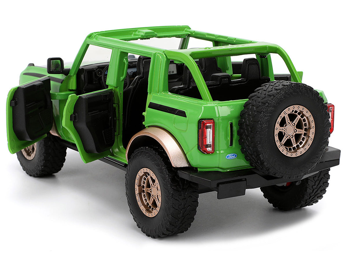 2021 Ford Bronco Green with Black Stripes and Green M&M's Diecast Figure "Hollywood Rides" Series 1/24 Diecast Model Car by Jada - image 5