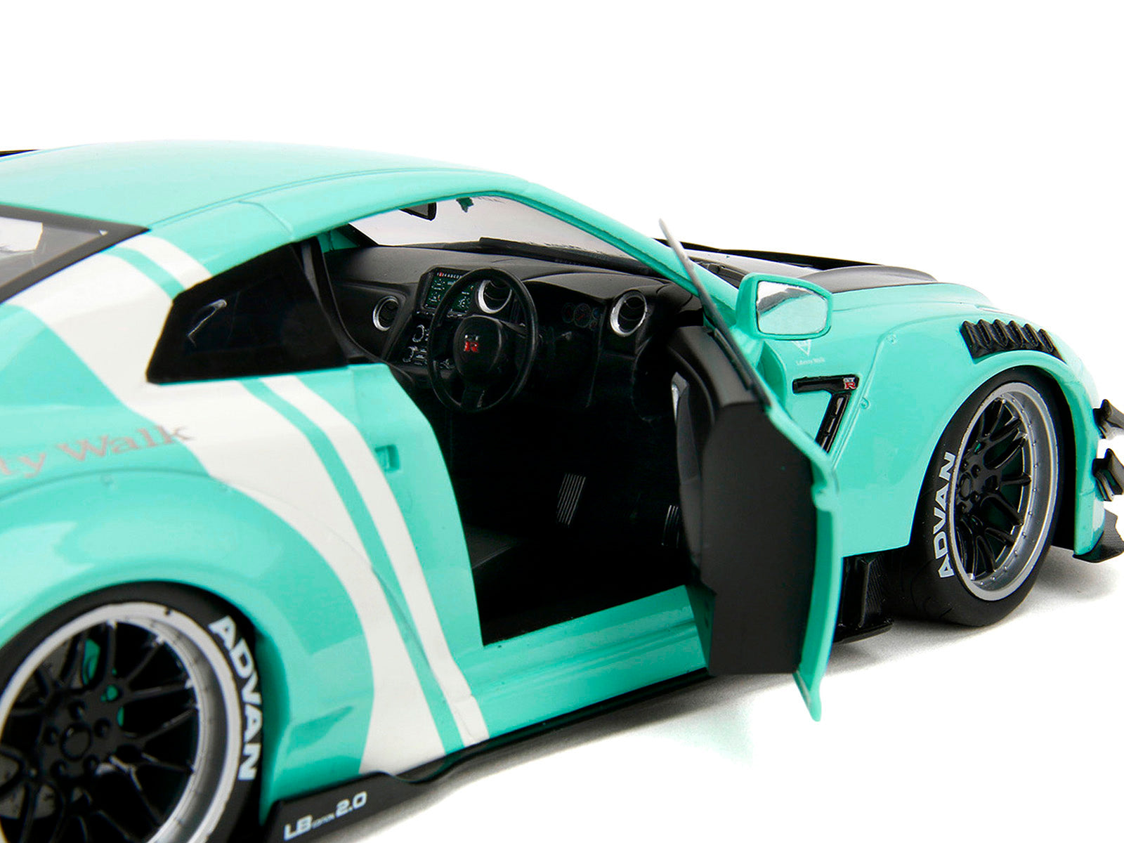 Nissan GT-R (R35) Liberty Walk Body Kit 2.0 RHD (Right Hand Drive) Light Blue with Black Hood and White Stripes "Pink Slips" Series 1/18 Diecast Model Car by Jada - image 3