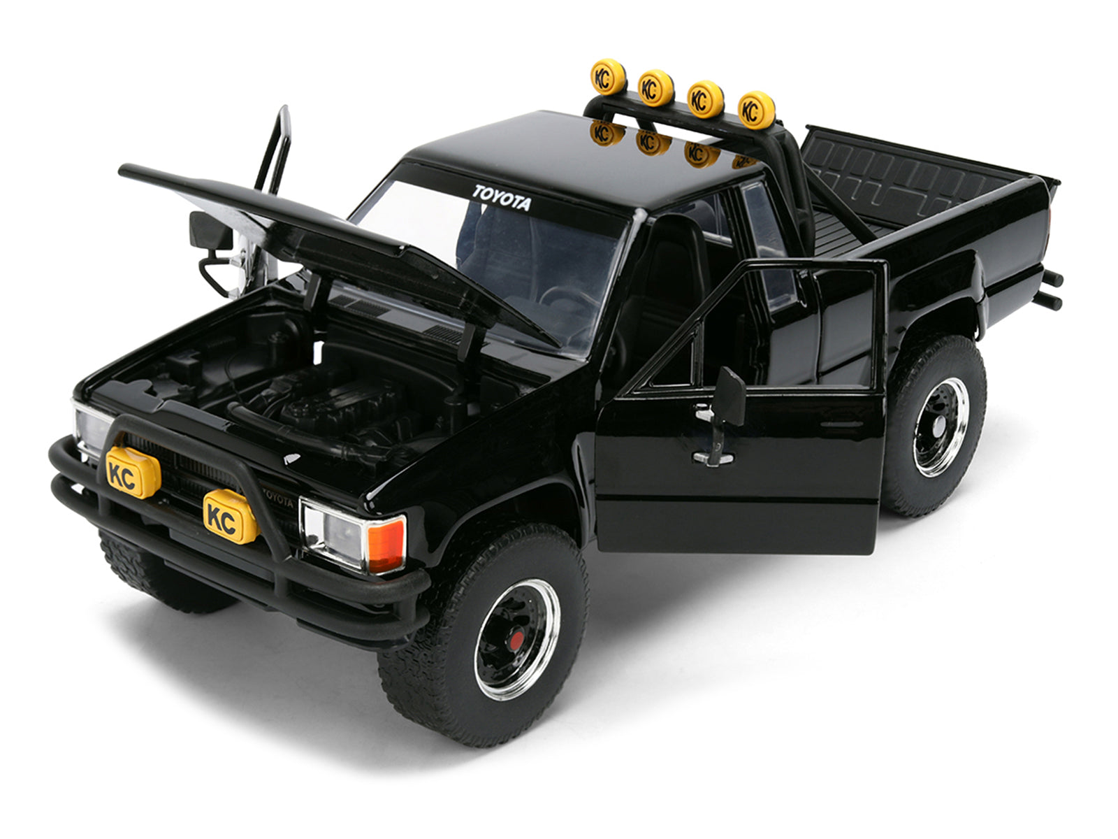 1985 Toyota SR5 Pickup Truck Black with Marty's Skateboard "Back to the Future" (1985) Movie "Hollywood Rides" Series 1/24 Diecast Model Car by Jada - image 2