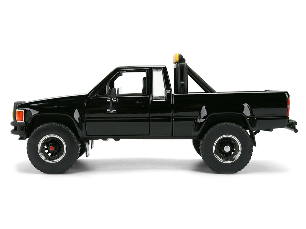 1985 Toyota SR5 Pickup Truck Black with Marty's Skateboard "Back to the Future" (1985) Movie "Hollywood Rides" Series 1/24 Diecast Model Car by Jada - image 3