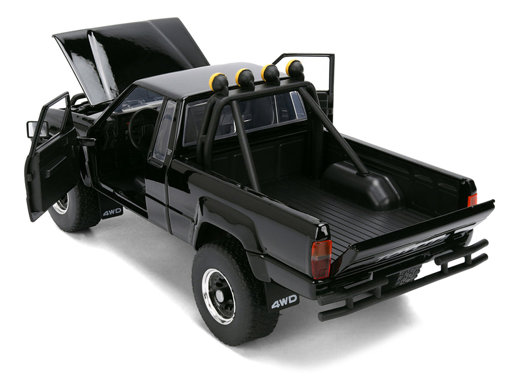 1985 Toyota SR5 Pickup Truck Black with Marty's Skateboard "Back to the Future" (1985) Movie "Hollywood Rides" Series 1/24 Diecast Model Car by Jada - image 4