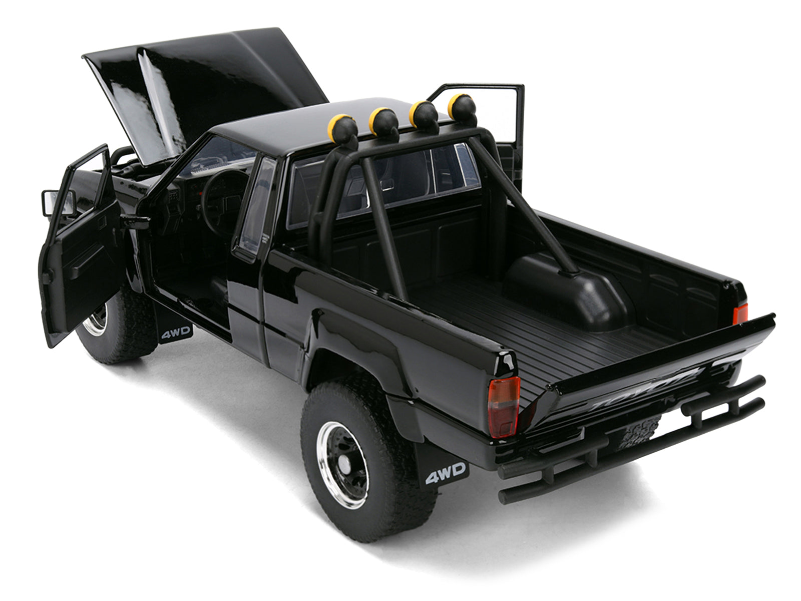 1985 Toyota SR5 Pickup Truck Black with Marty's Skateboard "Back to the Future" (1985) Movie "Hollywood Rides" Series 1/24 Diecast Model Car by Jada - image 4
