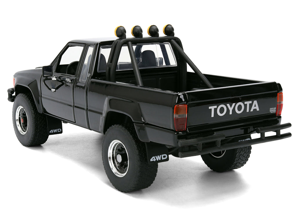 1985 Toyota SR5 Pickup Truck Black with Marty's Skateboard "Back to the Future" (1985) Movie "Hollywood Rides" Series 1/24 Diecast Model Car by Jada