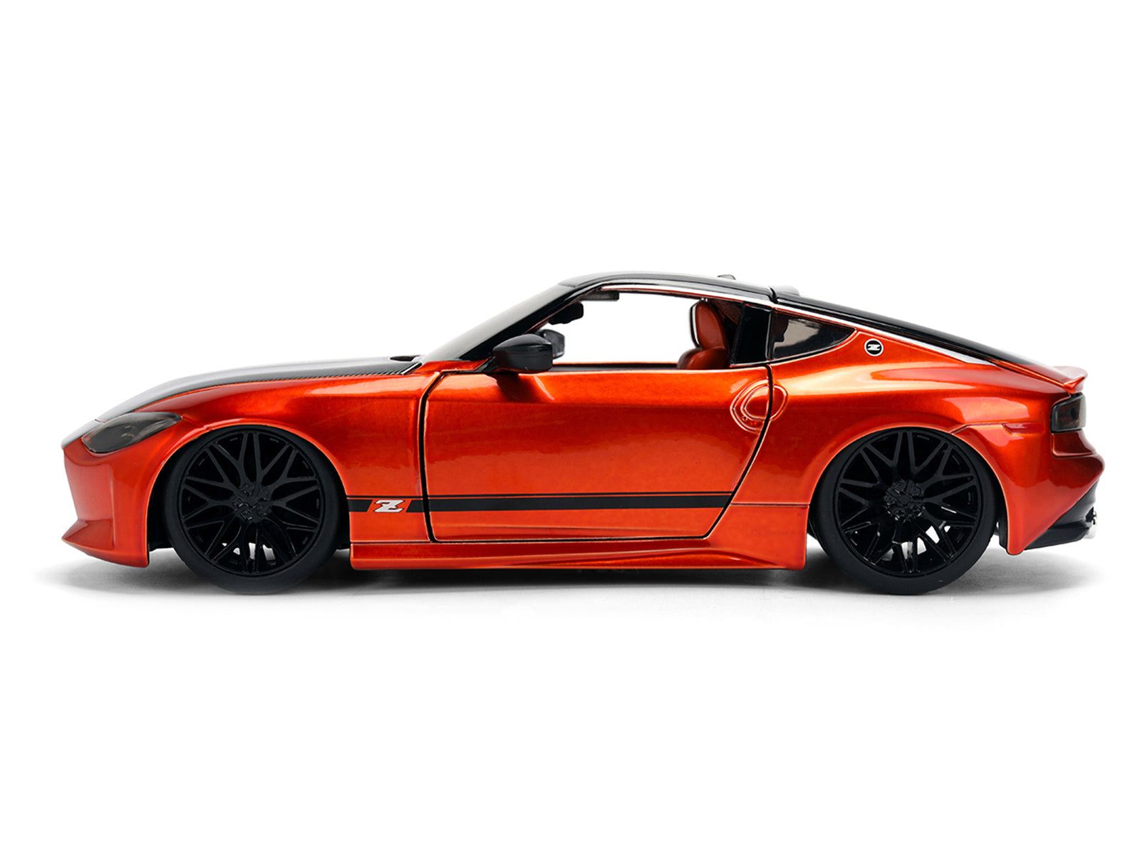 2023 Nissan Z Orange Metallic with Carbon Hood and Black Top "JDM Tuners" Series 1/24 Diecast Model Car by Jada - image 3