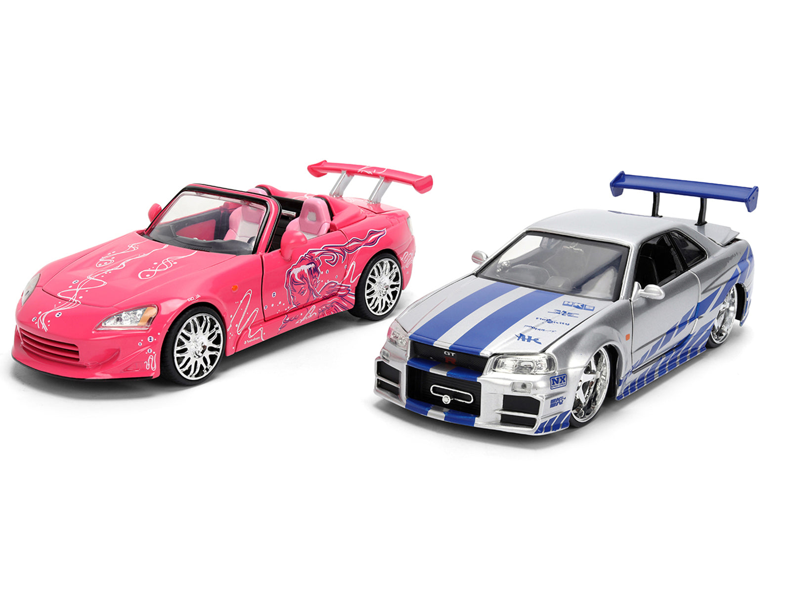 Brian's Nissan Skyline GT-R (R34) Silver Metallic with Blue Stripes and Suki's Honda S2000 Pink with Graphics Set of 2 Cars "Fast & Furious 25th Anniversary" "Fast & Furious" Series 1/24 Diecast Model Cars by Jada - image 2