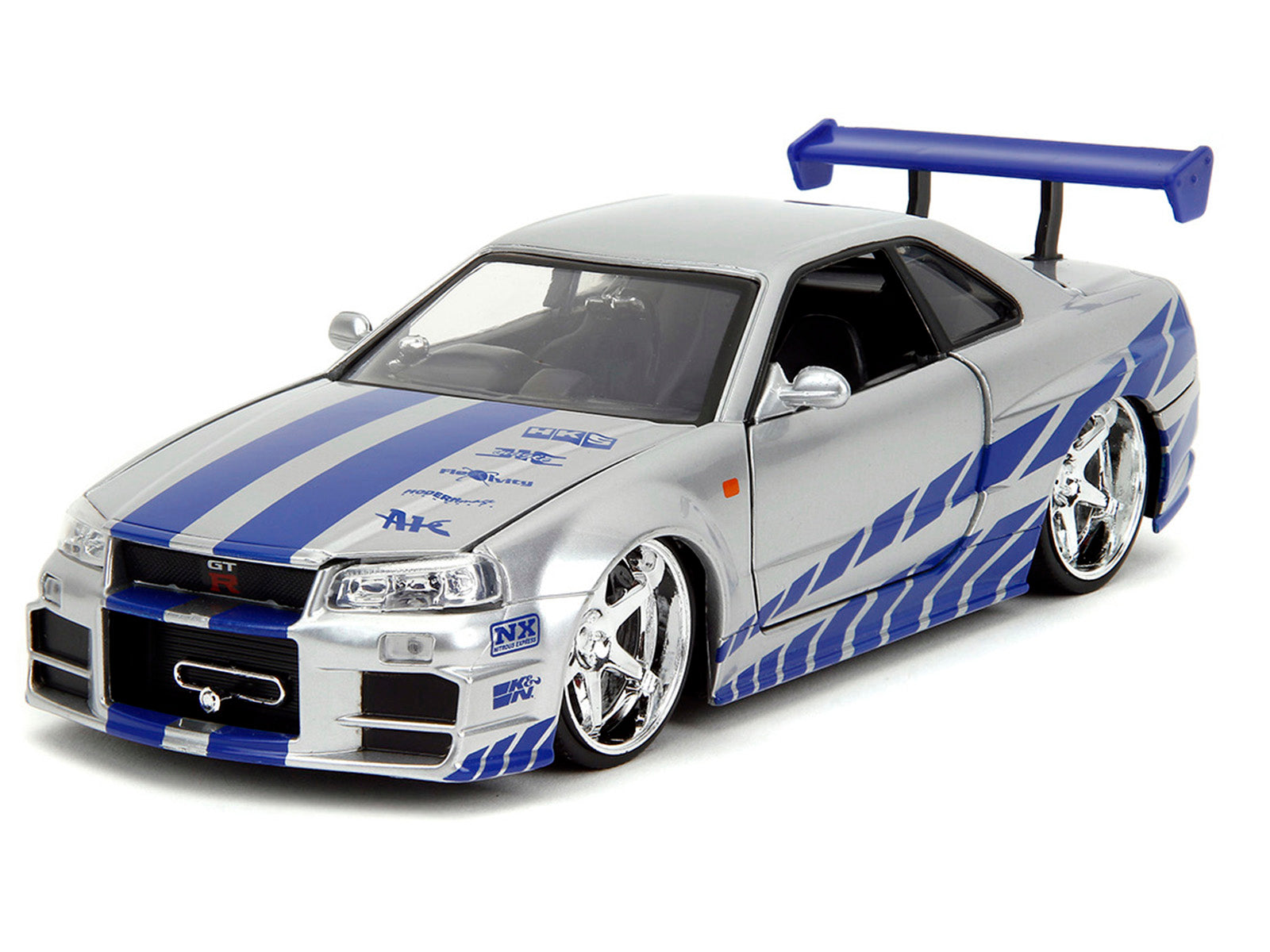 Brian's Nissan Skyline GT-R (R34) Silver Metallic with Blue Stripes and Suki's Honda S2000 Pink with Graphics Set of 2 Cars "Fast & Furious 25th Anniversary" "Fast & Furious" Series 1/24 Diecast Model Cars by Jada - image 4