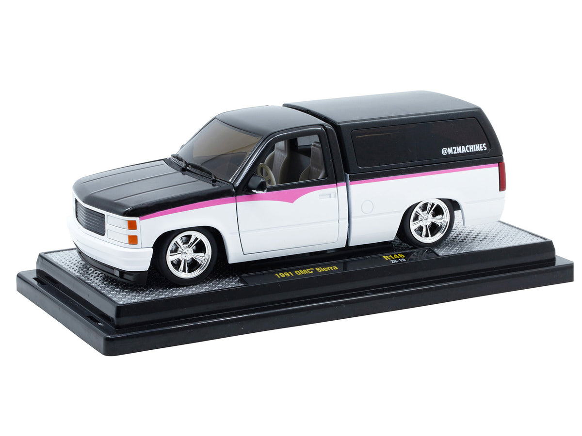 1991 GMC Sierra Pickup Truck with Camper Shell Black and White with Pink Stripes Limited Edition to 4850 pieces Worldwide 1/24 Diecast Model Car by M2 Machines - image 2