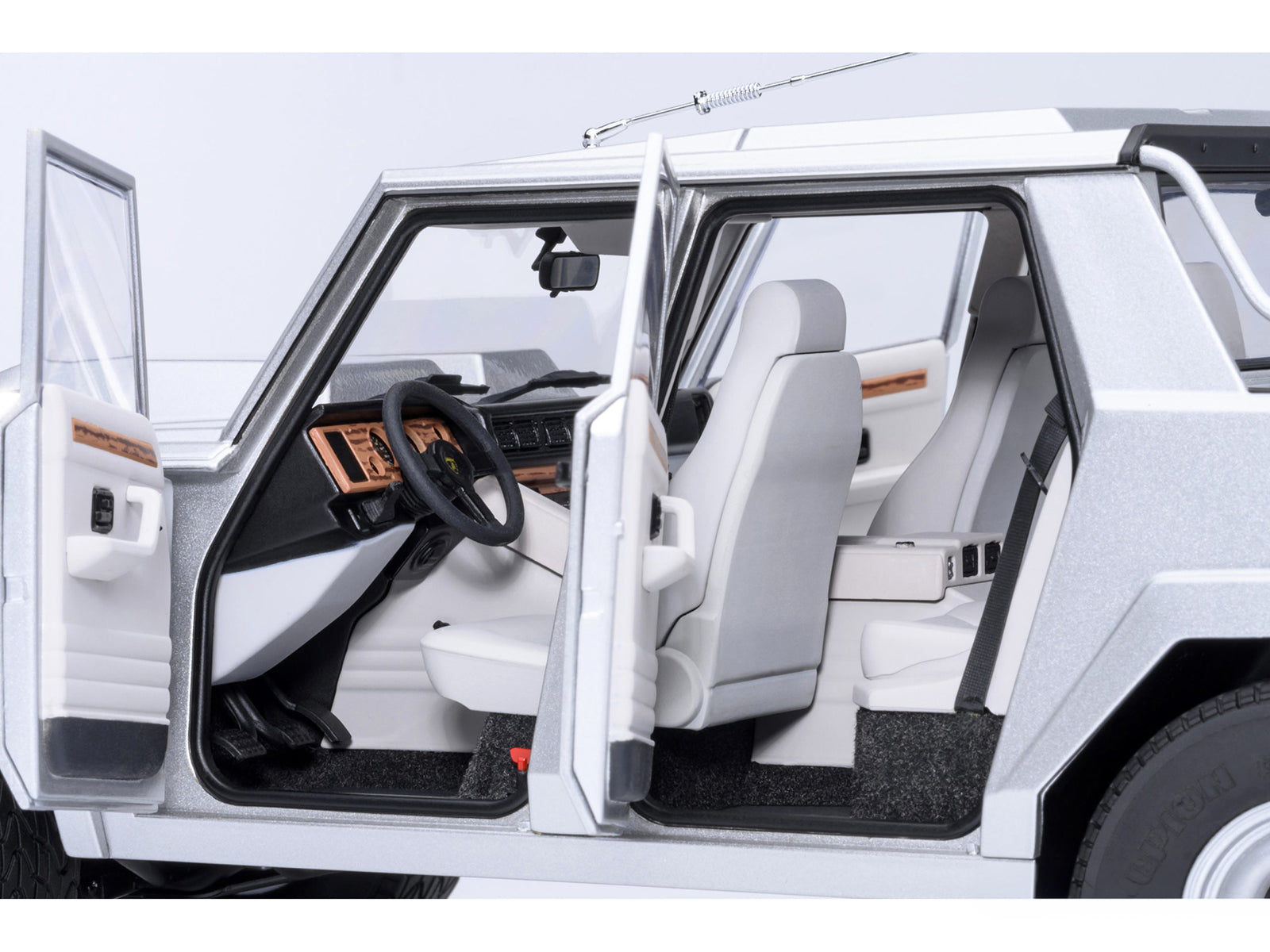Lamborghini LM002 Argento Silver Metallic with White Interior 1/18 Model Car by Autoart