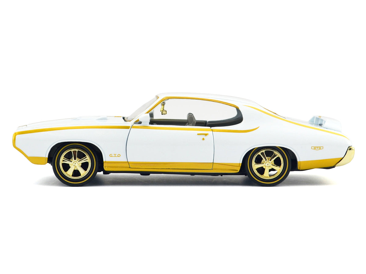 1969 Pontiac GTO Judge White Metallic with Gold Stripes "Luxe Legends" Series 1/24 Diecast Model Car by Motormax - image 2