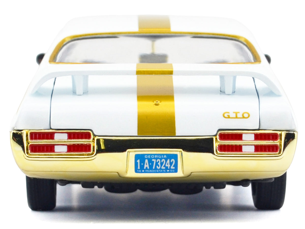 1969 Pontiac GTO Judge White Metallic with Gold Stripes "Luxe Legends" Series 1/24 Diecast Model Car by Motormax - image 5