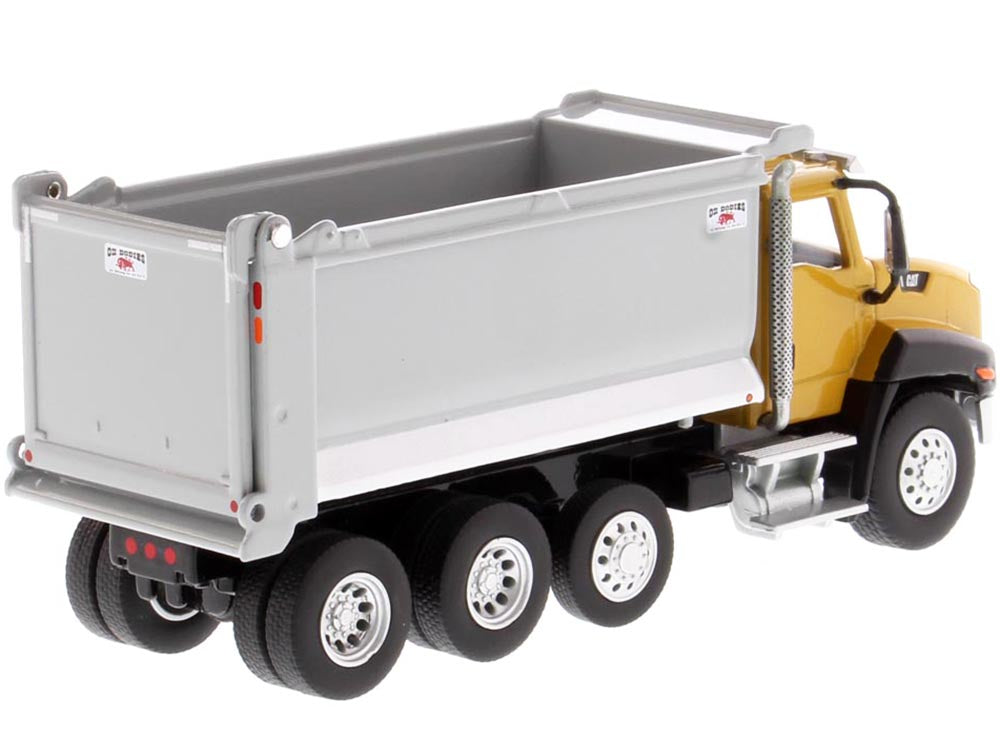 CAT Caterpillar CT660 Day Cab Tractor with OX Stampede Dump Truck "Play & Collect!" Series 1/64 Diecast Model by Diecast Masters - image 4
