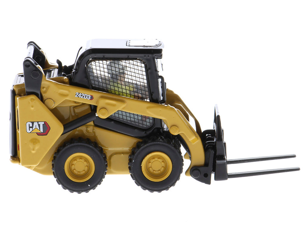 CAT Caterpillar 242D3 Wheeled Skid Steer Loader with Work Tools and Operator Yellow "High Line Series" 1/50 Diecast Model by Diecast Masters - image 2