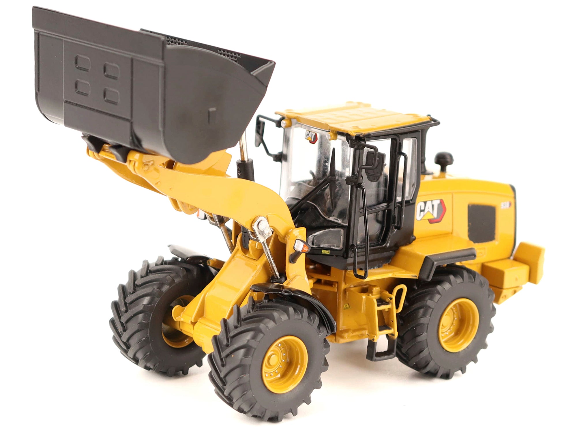 CAT Caterpillar 938 Wheel Loader with Operator Yellow "High Line" Series 1/50 Diecast Model by Diecast Masters - image 2