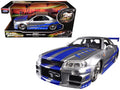 Brian's Nissan GTR Skyline R34 RHD (Right Hand Drive) Silver with Blue Stripes "Fast & Furious 25th Anniversary" 1/24 Diecast Model Car by Jada