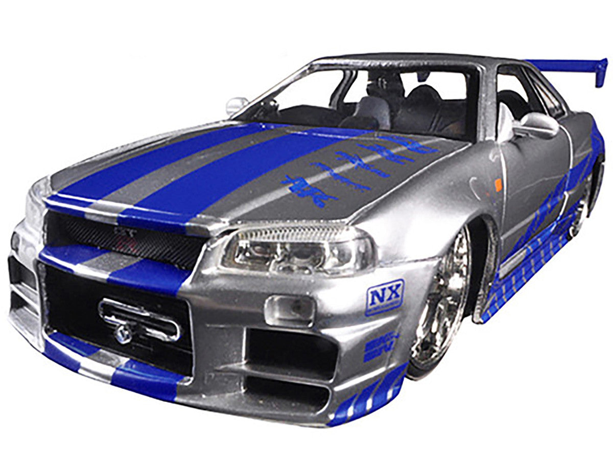 Brian's Nissan GTR Skyline R34 RHD (Right Hand Drive) Silver with Blue Stripes "Fast & Furious 25th Anniversary" 1/24 Diecast Model Car by Jada - image 2
