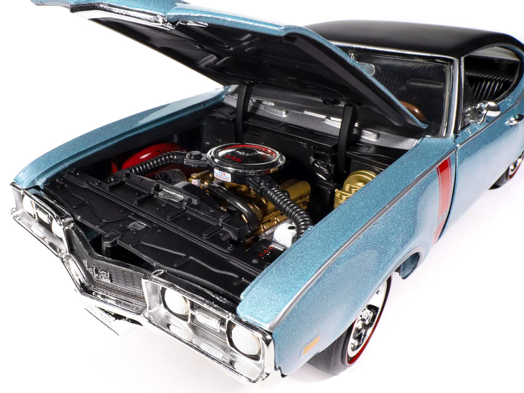 1968 Oldsmobile 442 W30 Holiday Coupe Teal Frost Metallic with Red Stripes and Black Vinyl Top "Hemmings Motor News July 2023 Cover Car" "American Muscle" Series 1/18 Diecast Model Car by Auto World - image 3