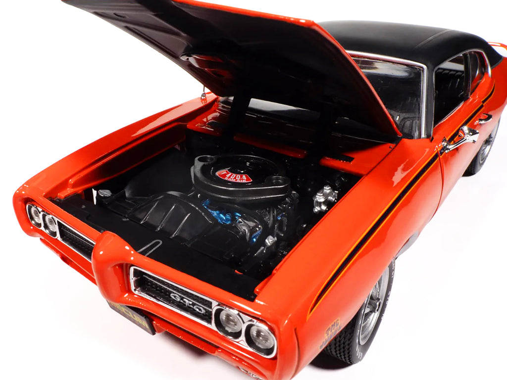 1969 Pontiac GTO Judge Carousel Red with Black Stripes and Black Vinyl Top "Mecum Auctions" "American Muscle" Series 1/18 Diecast Model Car by Auto World - image 3